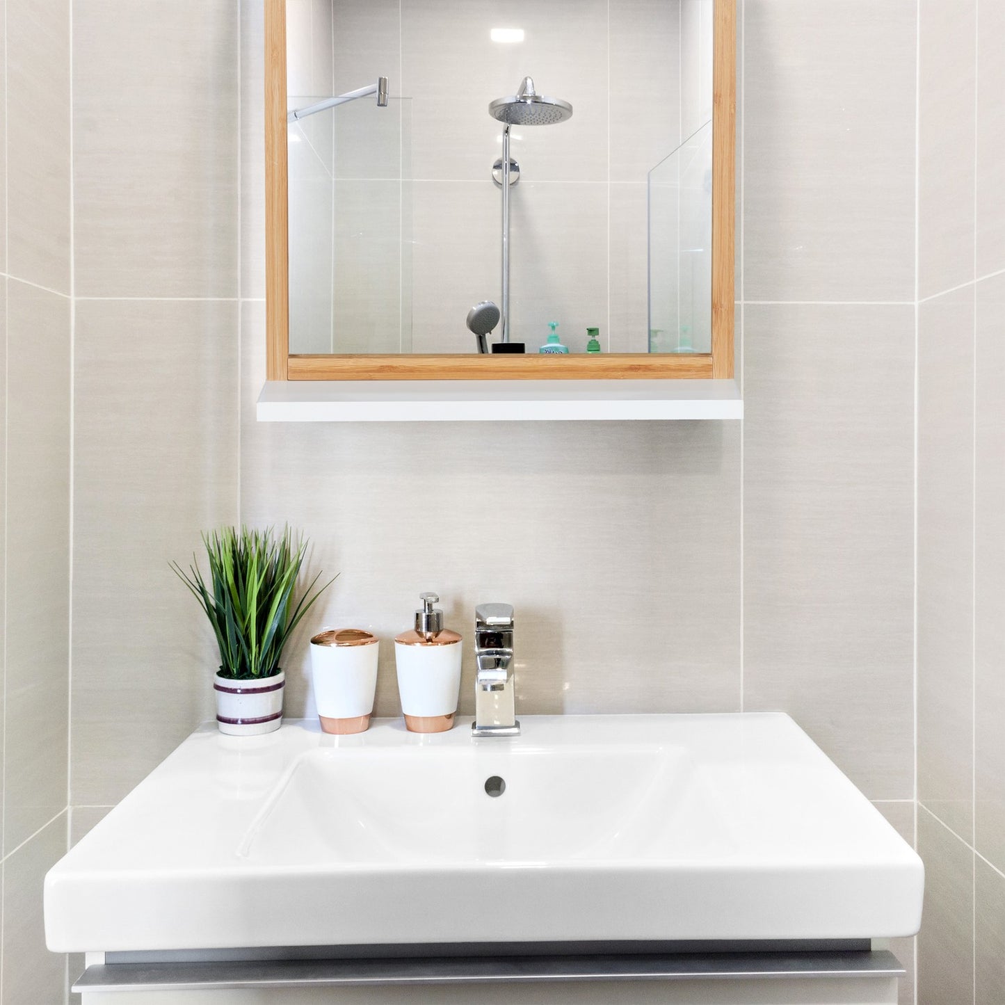 Wall mirror with shelf