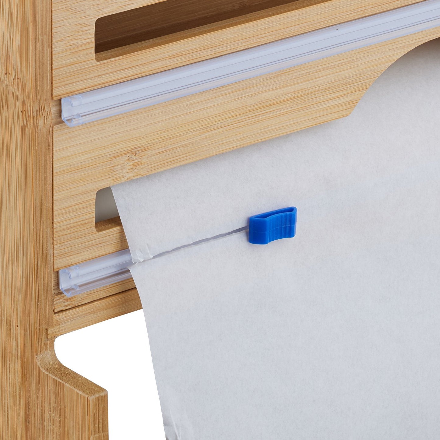 Wall-mounted roll holder
