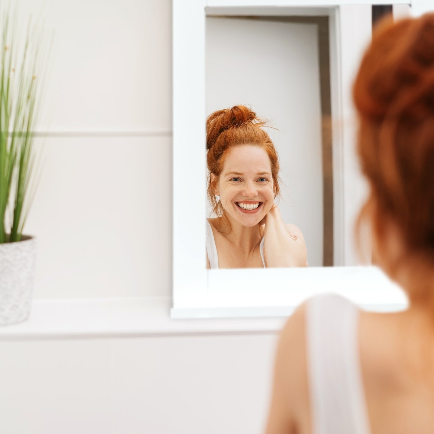 White wall mirror with shelf