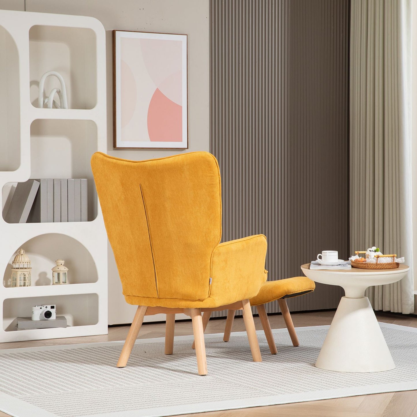 Orange corduroy wing chair with stool, wooden legs