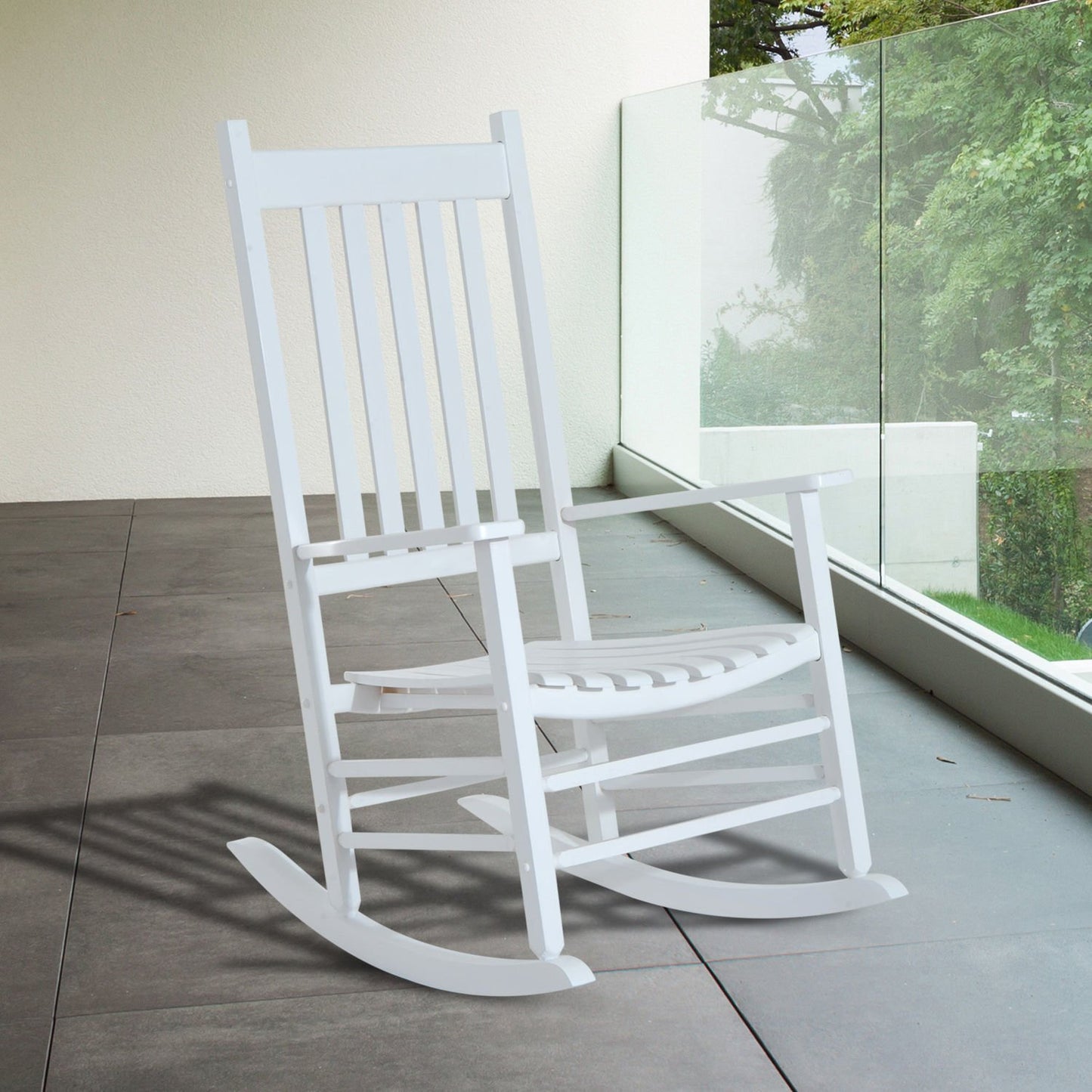 White wooden rocking chair with armrests for garden relaxation
