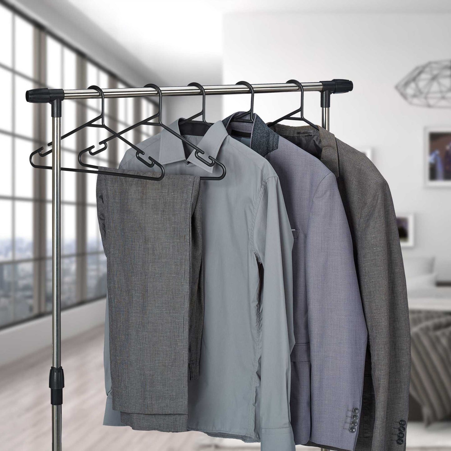 set of 24 coat hangers in black plastic