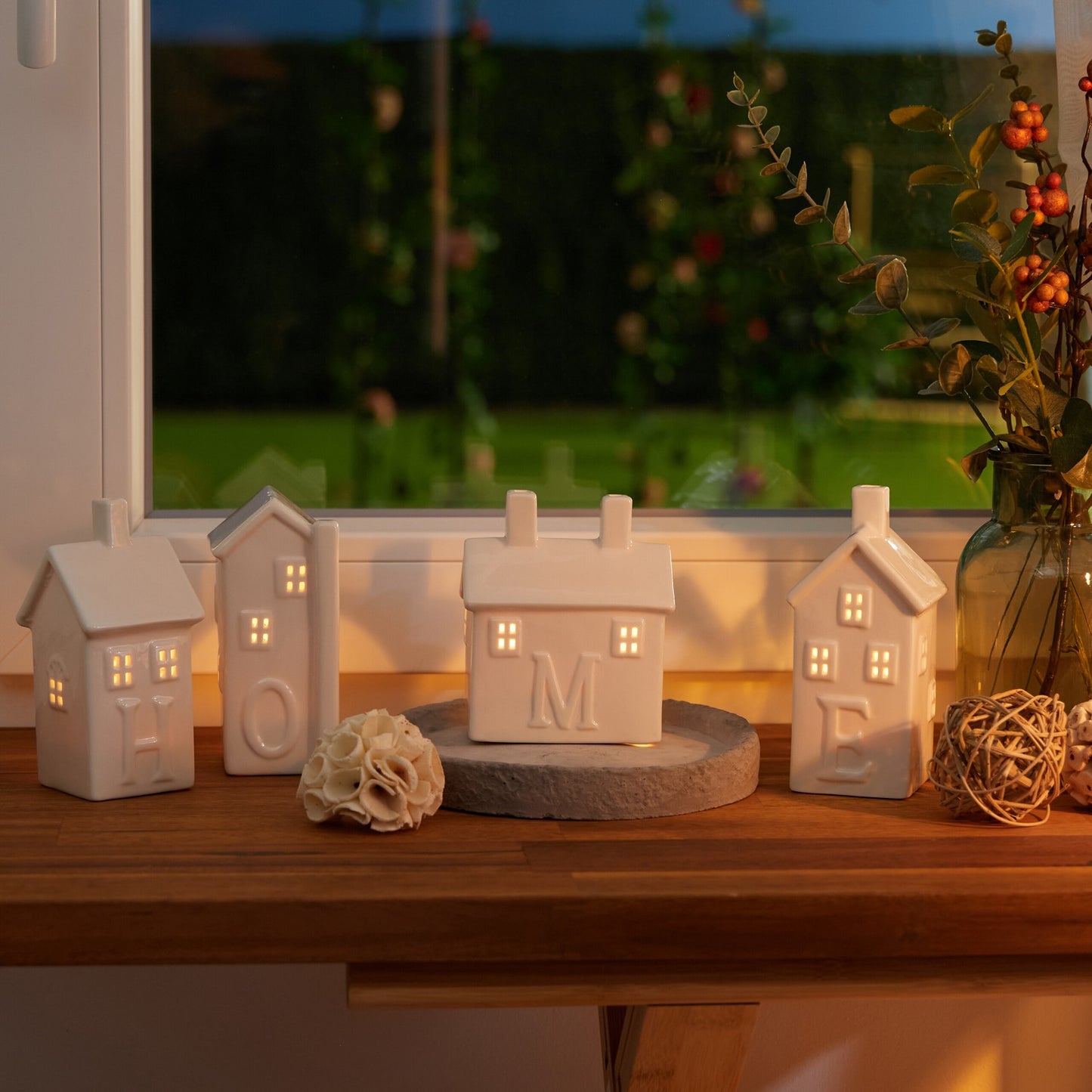 set of 4 ceramic "Home" heat candle holders